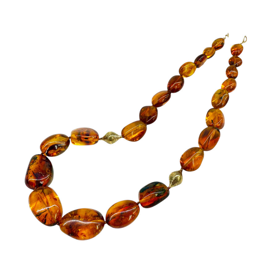 Baltic amber beads with preserved ancient insects, strung with gold clasp