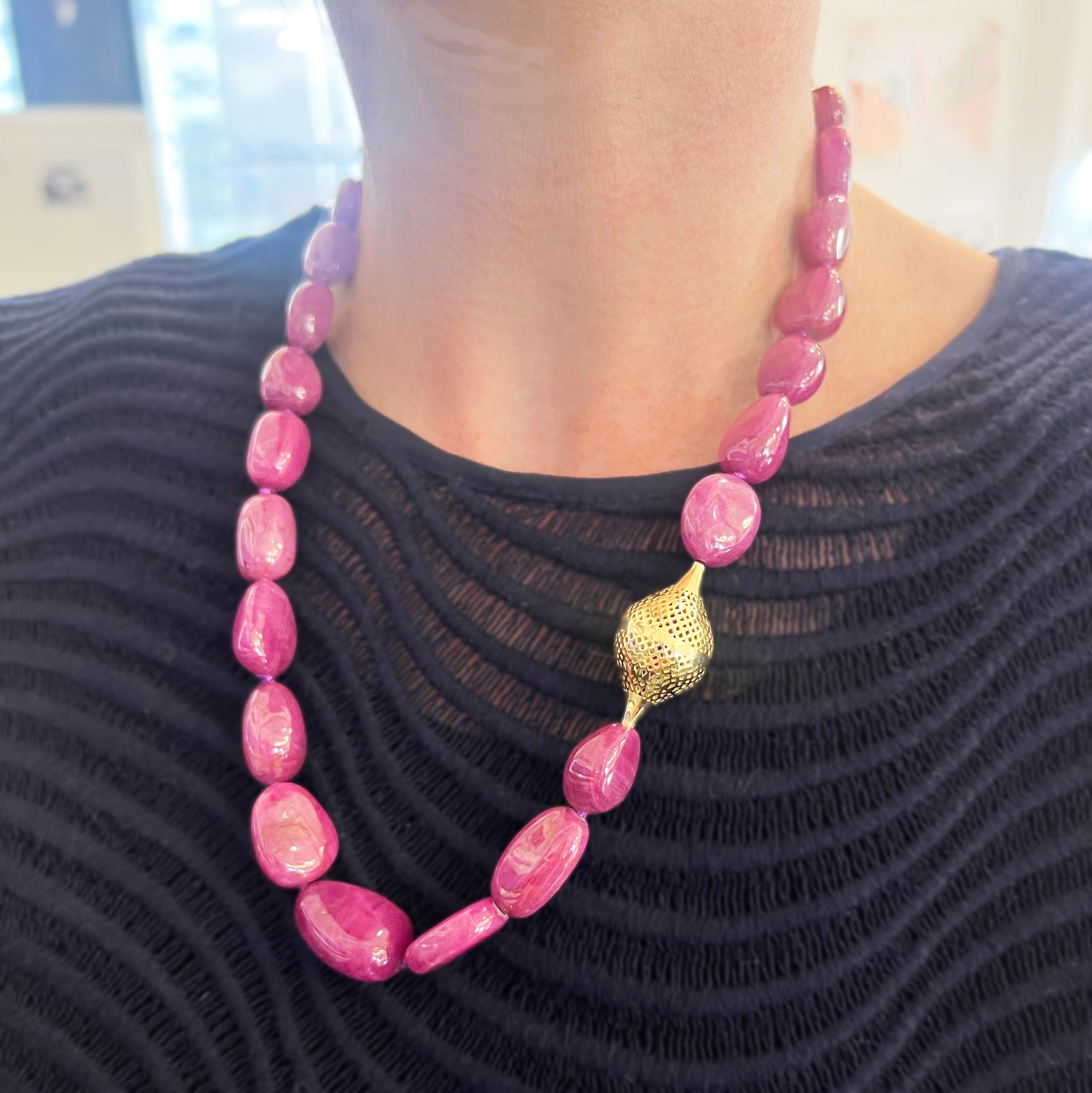 Ruby necklace with feature finial bead
