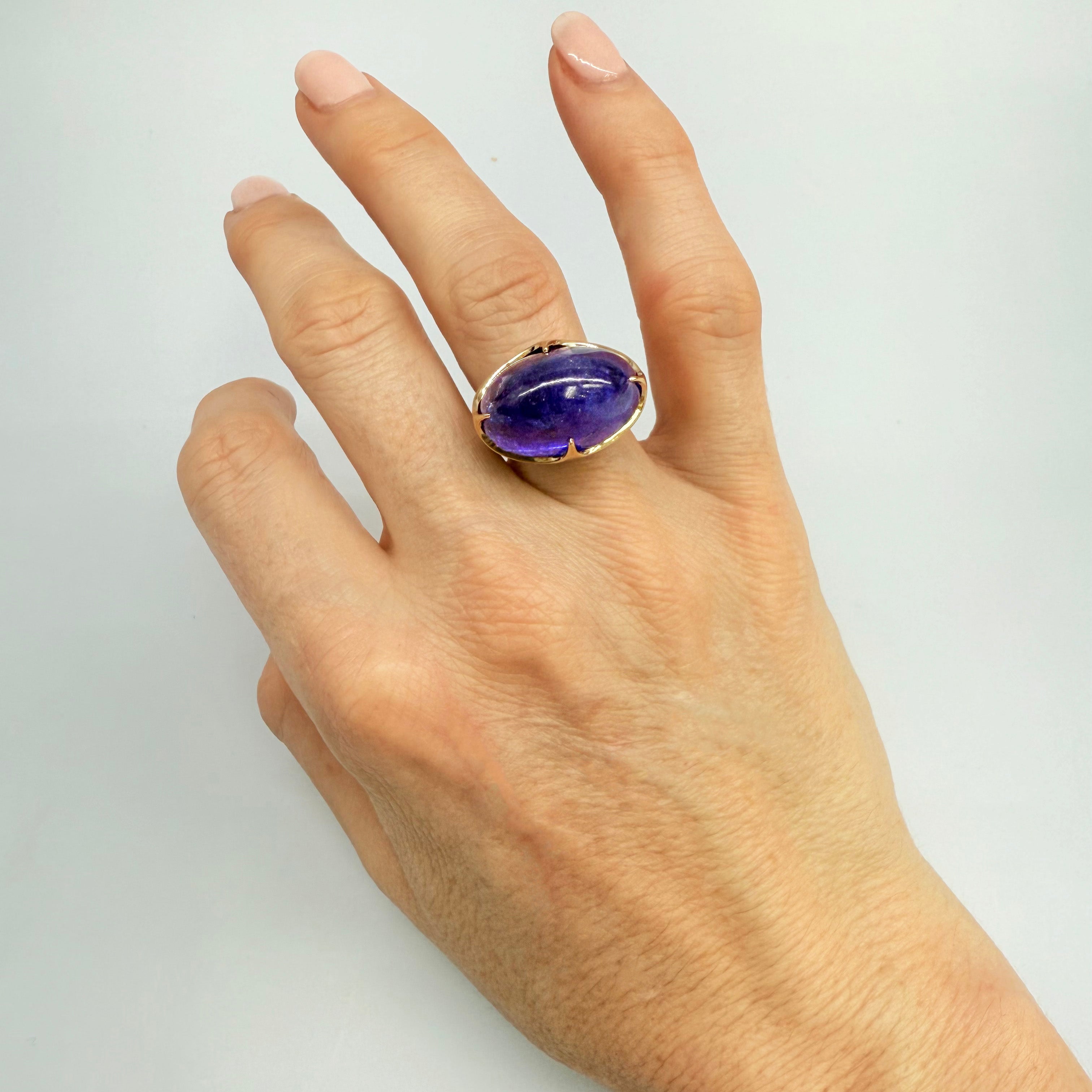 Tanzanite Curved Claw Set Ring
