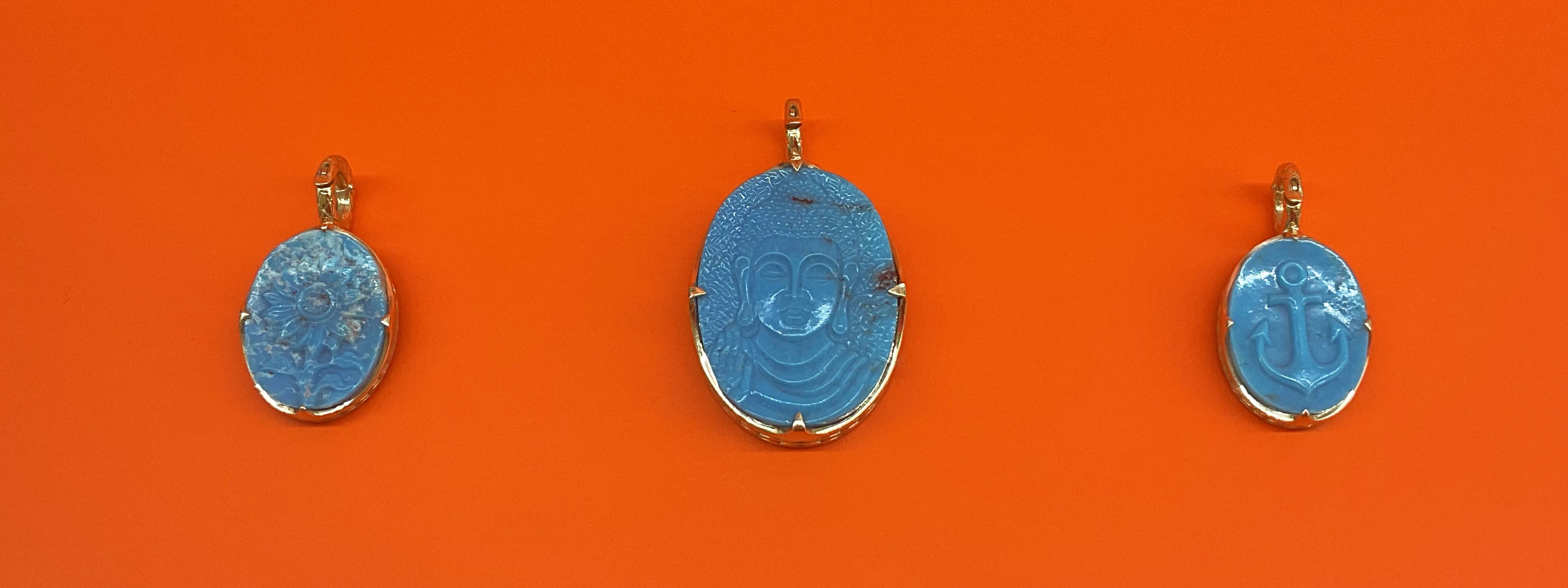 Carved Kingman Turquoise Pendants