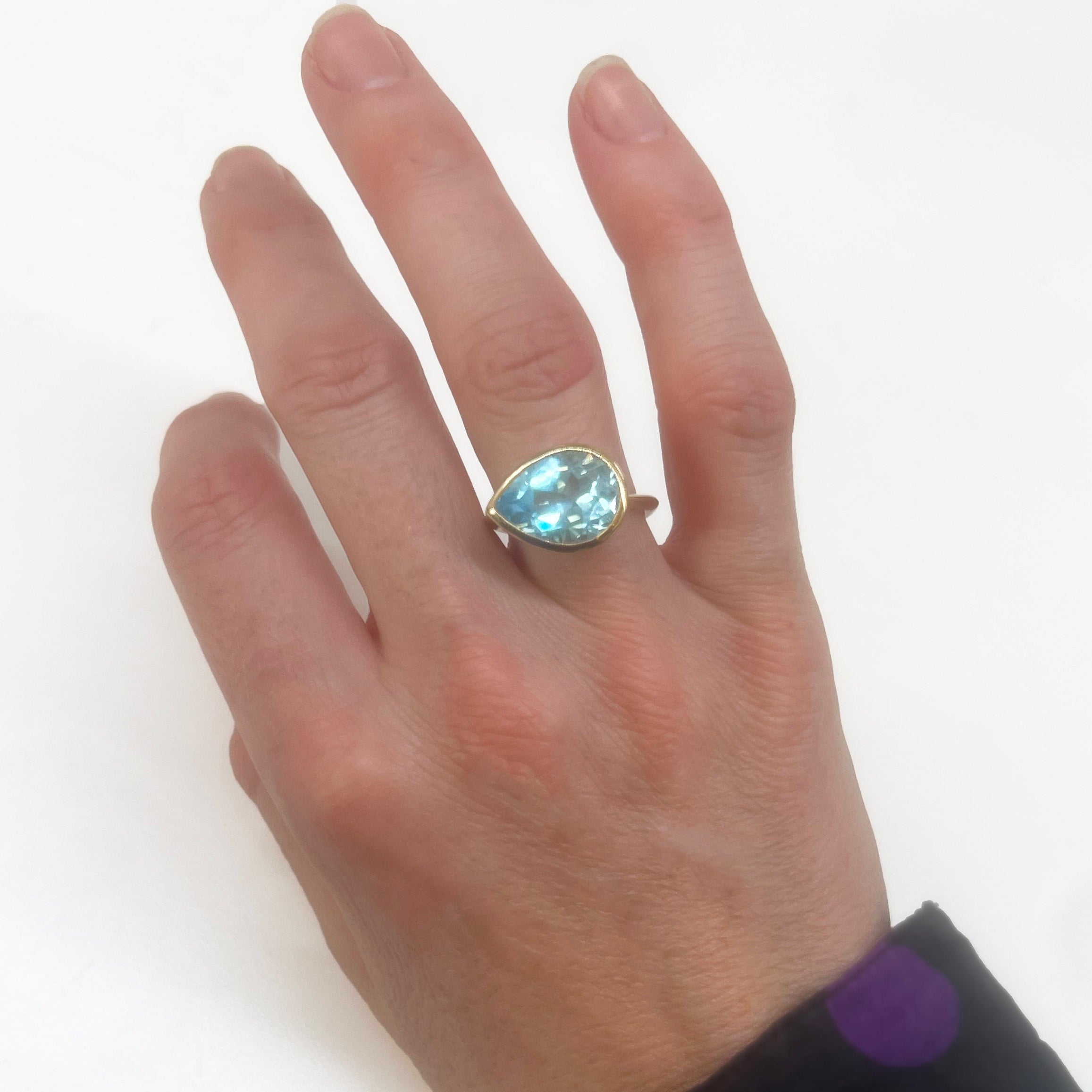 18K Yellow Gold Crownwork® Ring with East-West Pear Shaped Blue Topaz