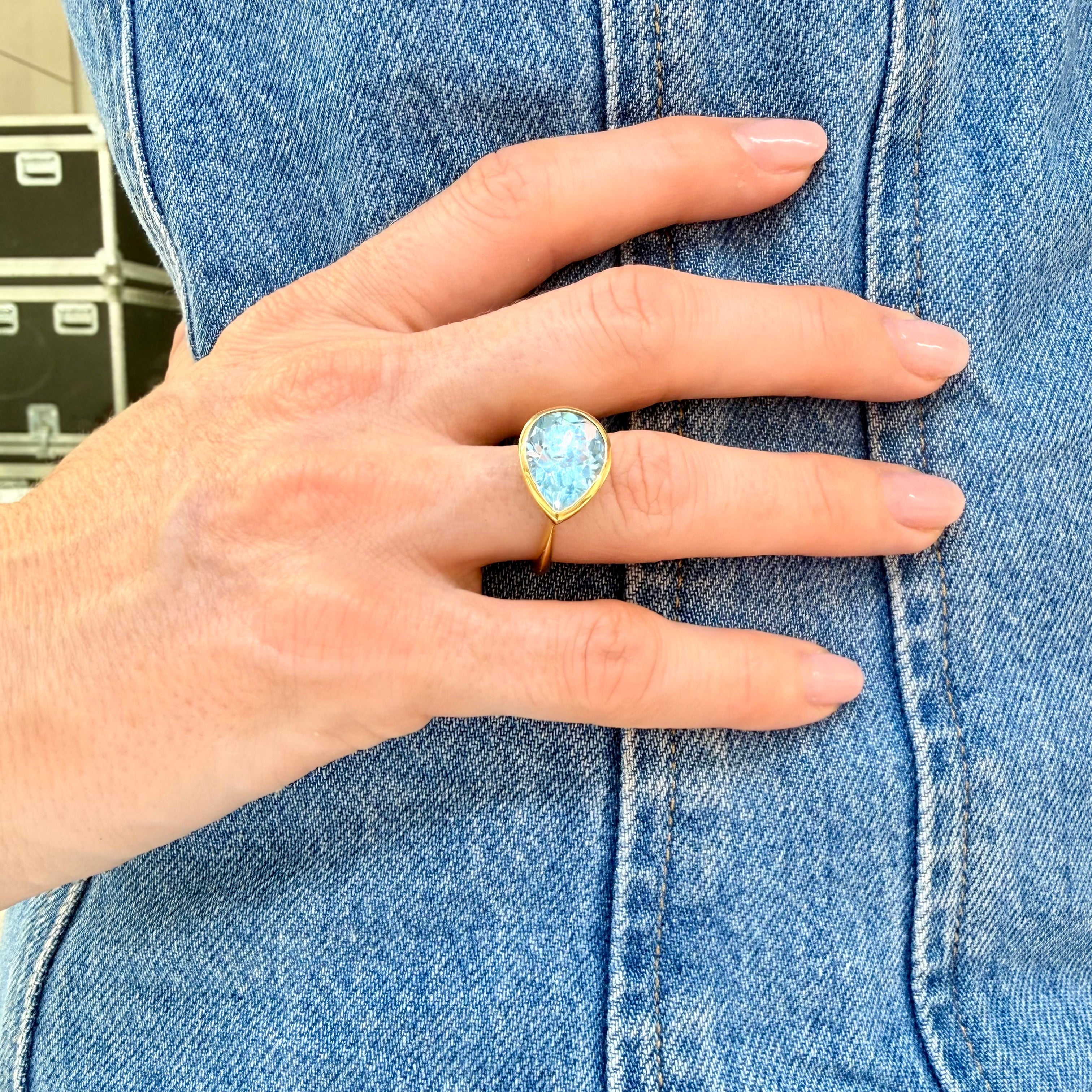 18K Yellow Gold Crownwork® Ring with East-West Pear Shaped Blue Topaz