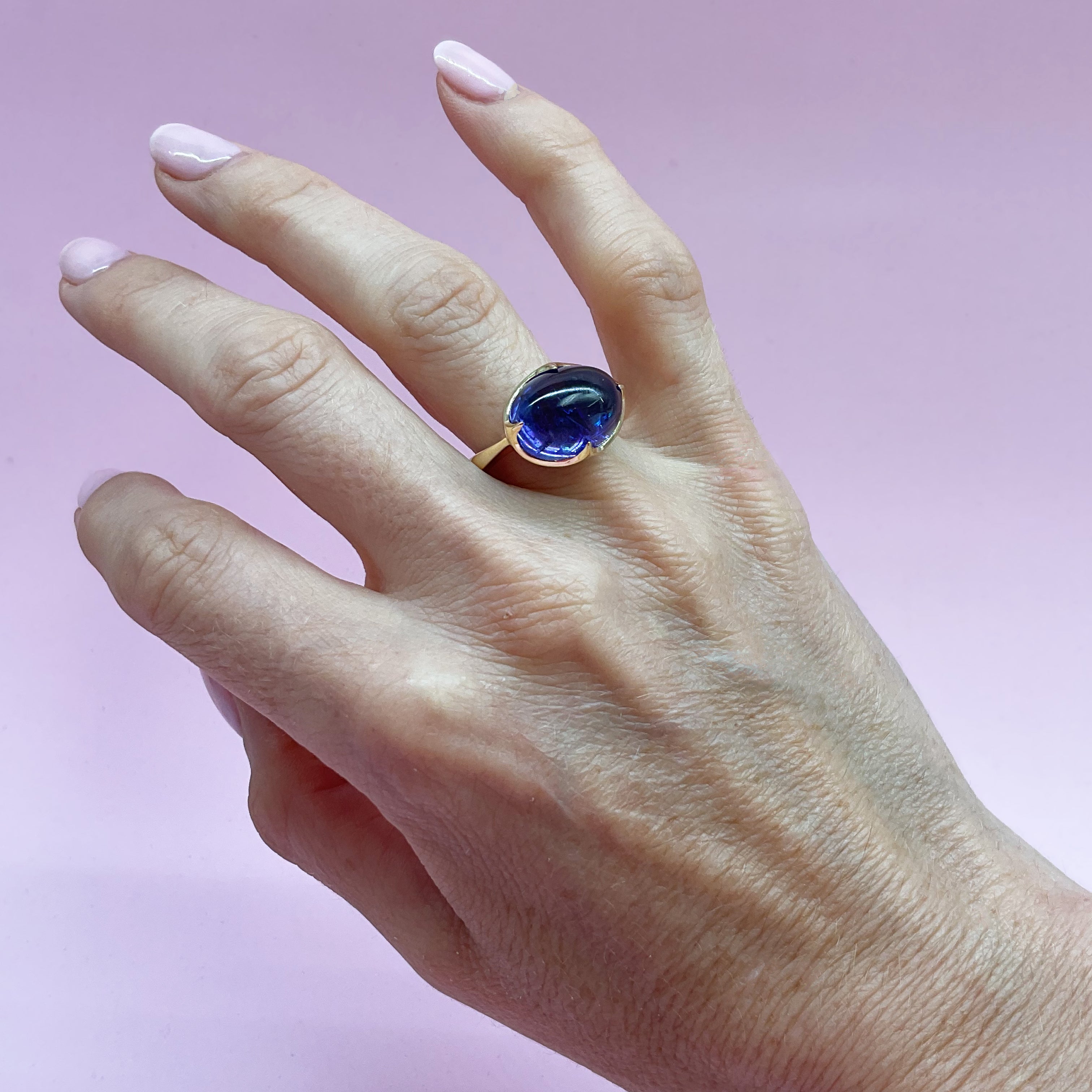Tanzanite Curved Claw Set Ring