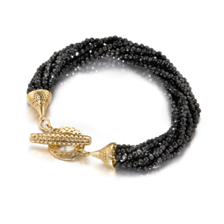 this is a multi strand black spinel finial stretch bracelet