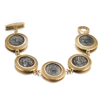 this is a crownwork framed alexander coin bracelet with diamond toggle.