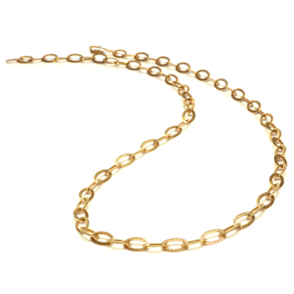 This is an image of a small gold chain necklace draped