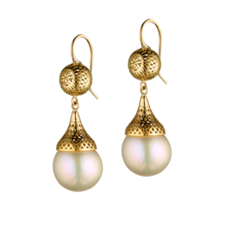 These are fresh water pearl earrings hanging off an 18k Yellow Gold ball