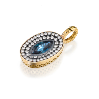 This is an image of an 18k yellow gold pendant featuring a blue/green sapphire center stone and pave diamond surround