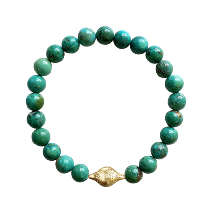 this is the product shot of a turquoise stretch bracelet with an 18k yellow gold finial