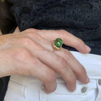 Bezel set green tourmaline ring
