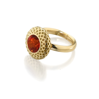 This is a product image of a yellow gold pillow top ring with a bezel set orange sapphire stone in the middle