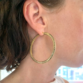 This image shows our large gold crownwork hoops work so you can see how look on