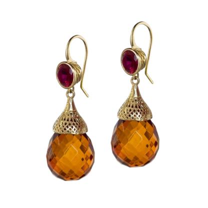 This is an garnet earring with amber quartz drop