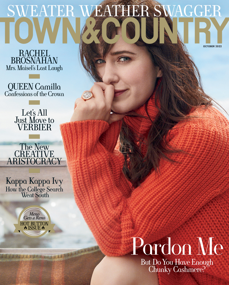 This is the cover for the October Town and Country - its features a brunette women wearing an orange turtleneck sweater