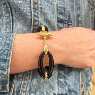 this is a model photo of the black onyx crownwork link bracelets