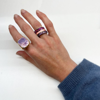 This is an image of our pink and lavender hued rings being worn