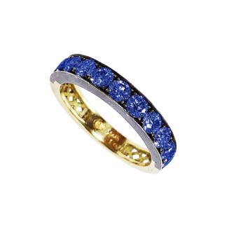 This is an image of our sapphire stacker band with sapphires set in oxidized silver and half gold band