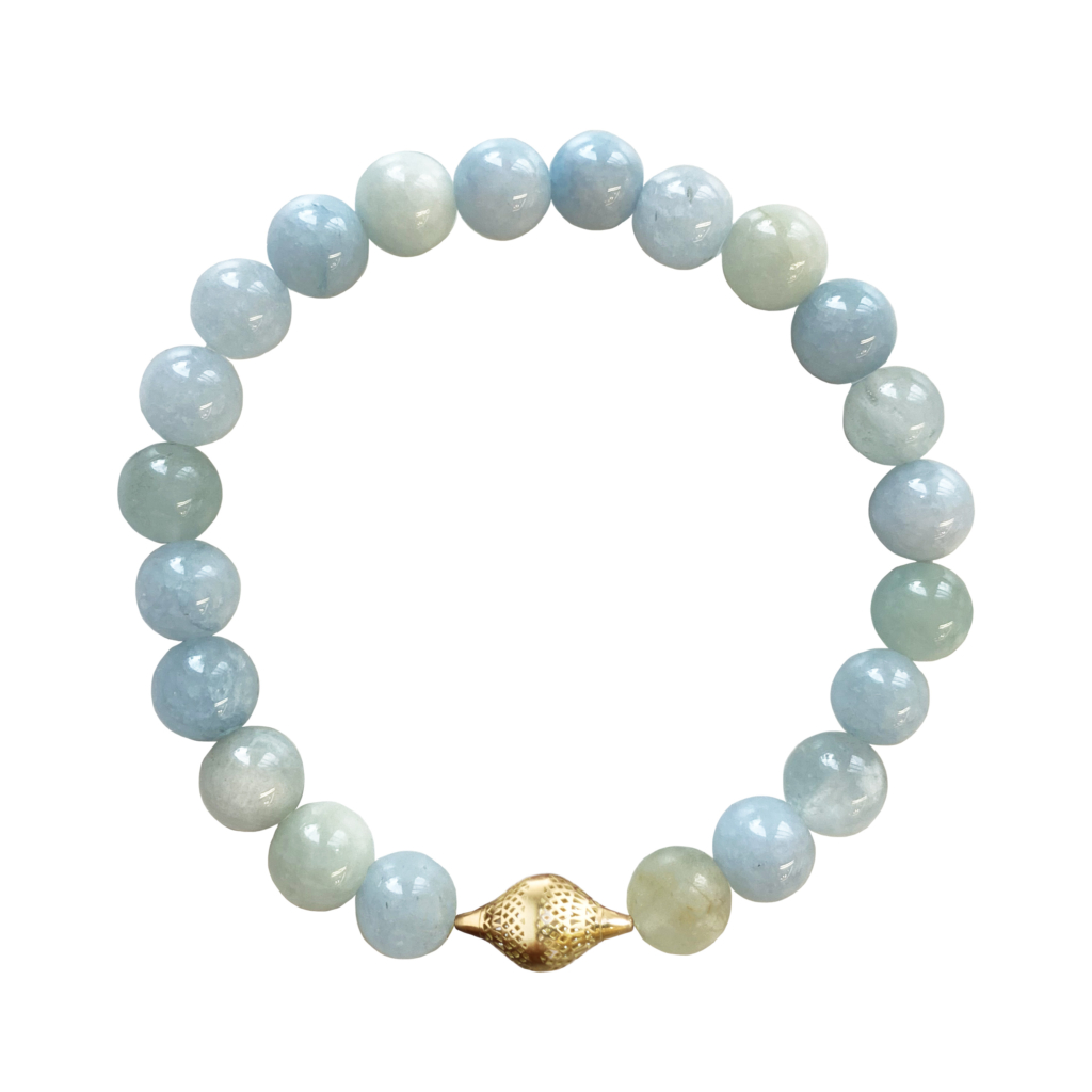 This is a photo of an aquamarine beaded stretch bracelet with small 18k yellow gold crownwork finial