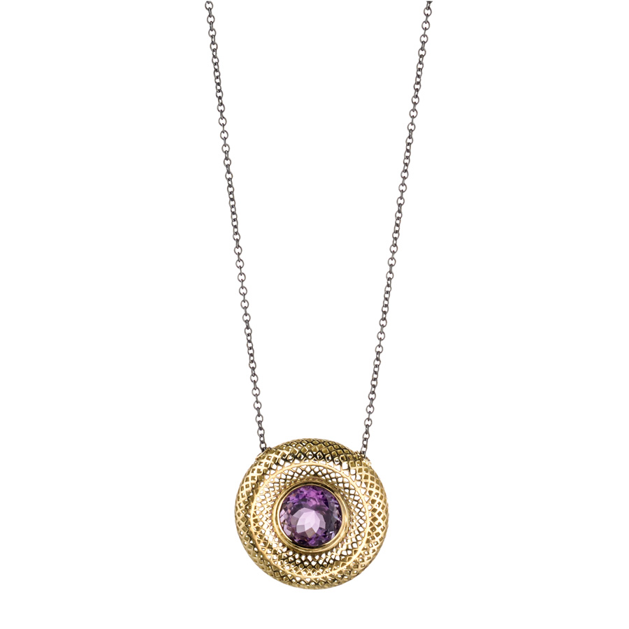 This is a photo of a amethyst gemstone set in an 18k yellow gold crownwork pendant