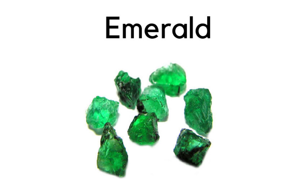 This is an image of raw emeralds being used for educational purposes 