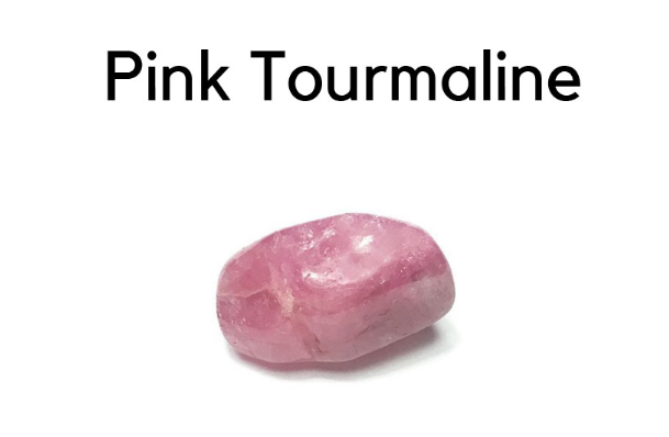 This is a photo of a natural raw piece of pink tourmaline stone