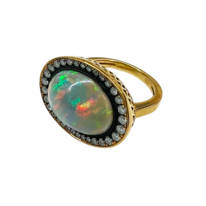 This is a product shot of our opal and diamond east/west ring