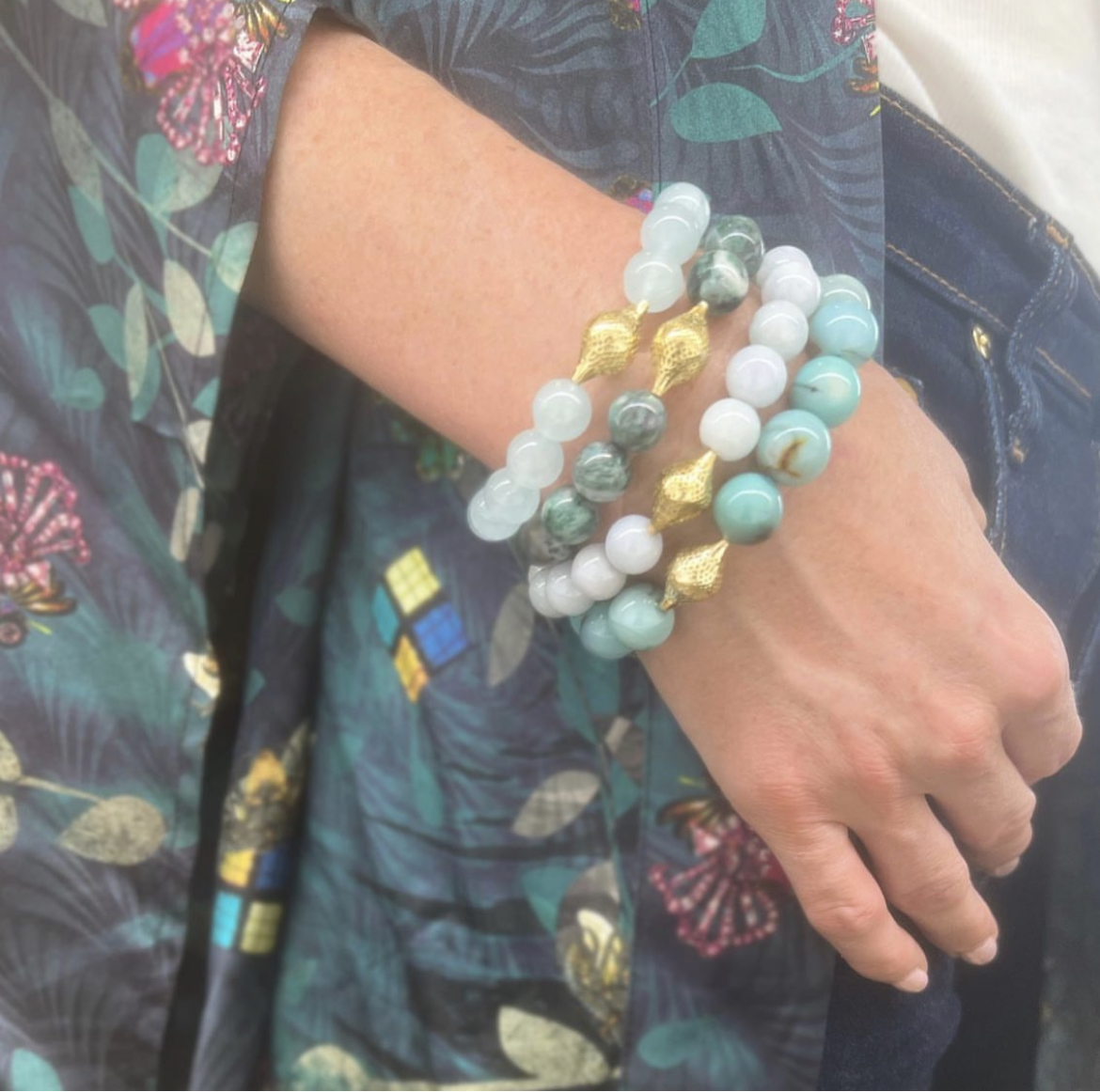 This is a photo of beaded stretch bracelets worn on the wrist
