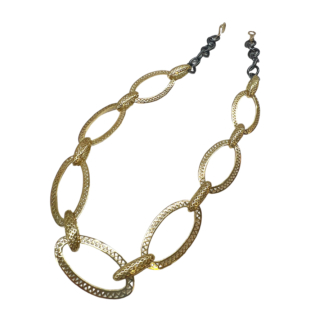 This is a 18k Yellow Gold Crownwork disc link chain with oxidized silver chain