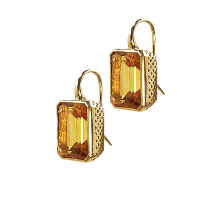 This is a product shot of a pair of emerald cut bezel set earrings set in 18k yellow gold crownwork