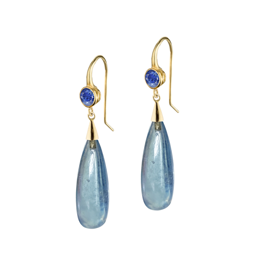 This is a product image for a pair of light blue sapphire earrings with long aquamarine drops