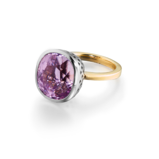 This is a product shot of an 18k yellow gold crownwork cocktail ring with bexel set kunzite stone in platinum white gold setting